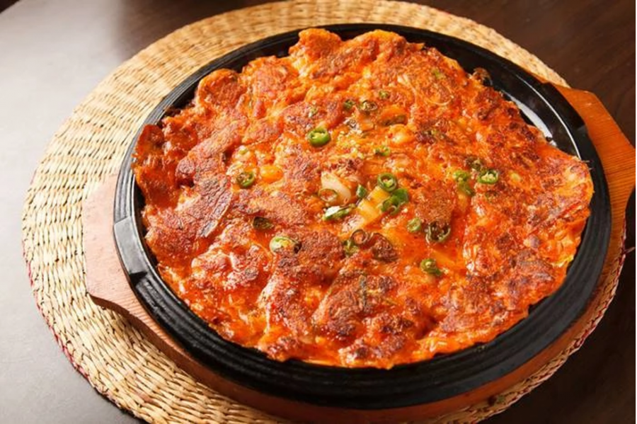 The kimchi pancake, also referred to as kimchi-jeon, is a traditional Korean folk dish and can be served as a snack, side dish, or appetizer. 