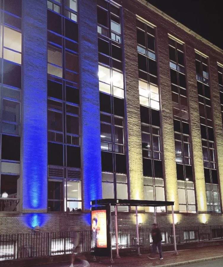 A building a Northeastern University lit up yellow and blue in support of Ukraine.

Photo by Emma Casali
