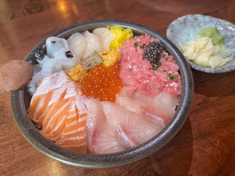 Seafood-Don at Nagomi Izakaya. This dish is served with all kinds of sashimi –  salmon, snapper, scallops, pickles, sea urchins, squid and mashed tuna. There are also some salmon roe, truffles and caviar, with pickled ginger slices and horseradish.