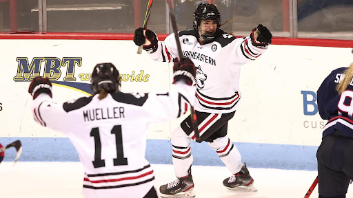 Chloé Aurard celebrates with her Northeastern Womens Hockey teammates