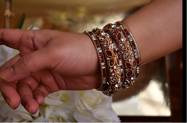 A hand with bracelets on it